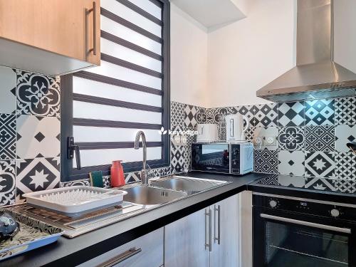 مطبخ, Tanière de St-Paul - 43 m2 - proche du front de mer (Taniere de St-Paul - 43 m2 - proche du front de mer) in Saint Paul