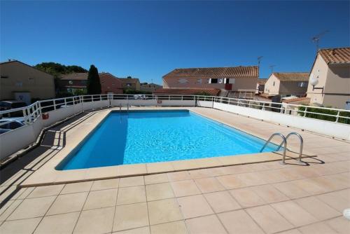 Peldbaseins, Maison T2 cabine 4 couchages, terrasse cloturee, residence Sun village avec piscine commune, 300m de in Portiraņa