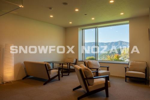 صالة مشتركة/ منطقة التلفزيون, Snowfox Nozawa in Nagano