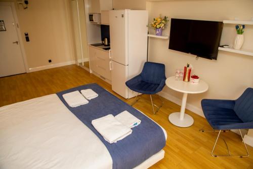 Orbi city - Premium Class Rooms - Tap to explore photos