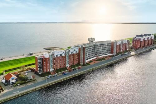 Strand-Apartment, Strandkorb, Meeresrauschen, Parkplatz in Wilhelmshaven, Deutschland