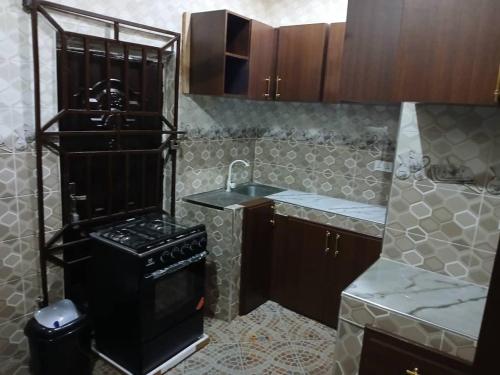 virtuve, Bright and Spacious Apartment in Agona Swedru