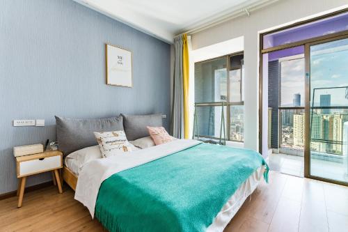 Kunming Qicaimen Shangpin Apartment - image 3