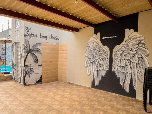 Casa com piscina na Enseada no Guarujá (Casa com piscina na Enseada no Guaruja) in ชารดิง วีร์จิเนีย