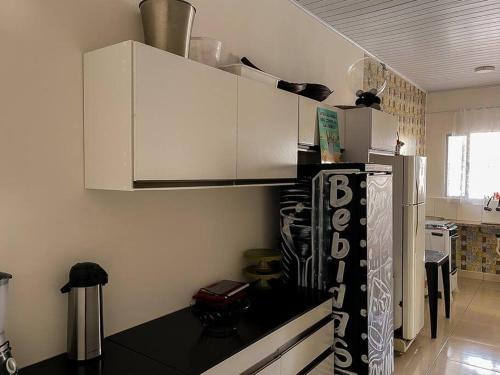 Casa com piscina na Enseada no Guarujá (Casa com piscina na Enseada no Guaruja) in ชารดิง วีร์จิเนีย