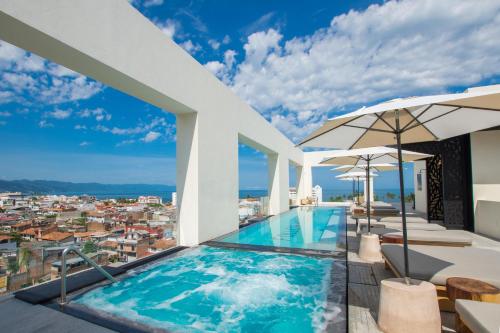 Blissful Escape with Stunning Views, Rooftop Pool in Puerto Vallarta, Mexico