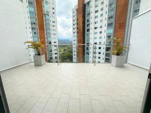 Belmonte 209-Lindo apartamento en Av centenario con pisicna gym in أرمينيا