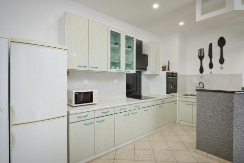 virtuve, Family-friendly apartments with swimming pool Uskoplje, Dubrovnik - 23452 in Brotnice