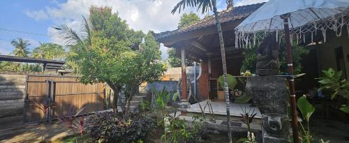 Garden, Lovina Guesthouse Mai Family in Lovina Beach