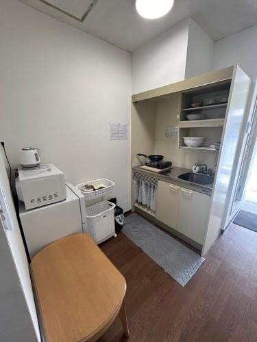 彦根びわこホテル裏のマンション 一室貸し切り50台無料駐車場付き台所あり自転車貸出可 BbQ可 ペット同伴可 in Hikone