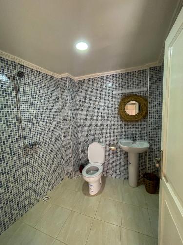 Locals Taghazout surfcamp Room Type - Standard Twin Room with Sofa