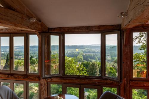 Koplietošanas atpūtas telpa ar TV, B&B La Mirande de Saint-Clar in Saint-Clar