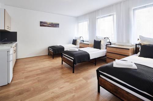 Lemon Suites 1,Apartment im Künstlerviertel - Nähe Innenstadt und UBahn, 2 Zimmer, 3 Einzelbetten und ein Doppelbett in Nürnberg, Deutschland
