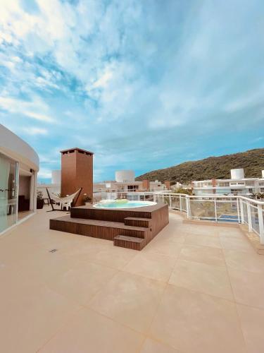 Apê Acqua - Marine Resort - 3 qtos - pé na areia (Ape Acqua - Marine Resort - 3 qtos - pe na areia) in ปอนตา ดาส กานาส