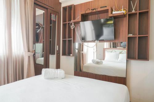 Modern Studio at Green Pramuka City Apartment By Travelio, Jakarta (photo 9)