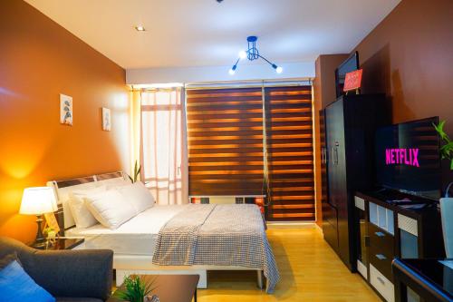 Studio in Makati - Fast WiFi, Big Balcony, Pool and Gym Access, Manille