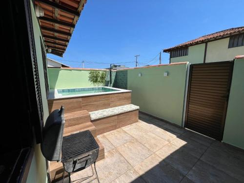 Svømmebasseng, Casa aconchegante a 7 min da Praia in Vila Luiza