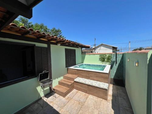 Svømmebasseng, Casa aconchegante a 7 min da Praia in Vila Luiza
