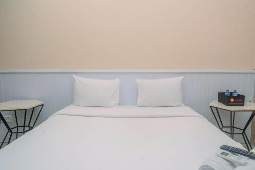 Minimalist and Comfy Studio at Grand Dhika City Apartment By Travelio