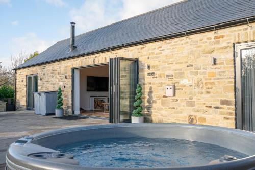 ทัศนียภาพภายนอกโรงแรม, Millfield Barn in บรอมป์ตัน ออน สเวล