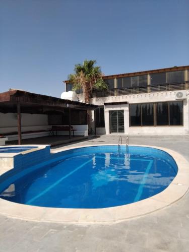 Swimming pool, Golden Horse Chalet And Club in Al Jizah