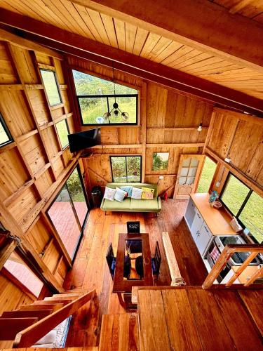 gedeelde lounge/tv-ruimte, Villa Elena Sumaco in Cosanga