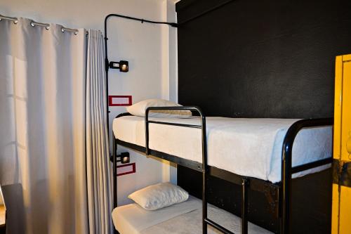 Hostel Mundo Joven Room Type - Bed in 6-Bed Female Dormitory Room Exterior Shared Bathroom - Zocalo View Hostel Mundo Joven Room Type - Bed in 6-Bed Female Dormitory Room Exterior Shared Bathroom - Zocalo View