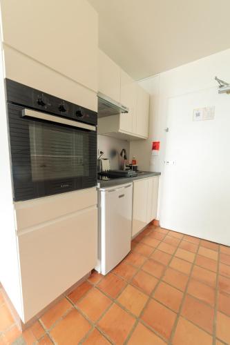 Bếp, Appartements avec vue mer à Tartane (Appartements avec vue mer a Tartane) in La Trinite