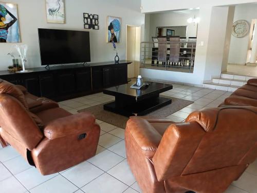 Lounge/area TV in comune, The Haven Guesthouse Ezulwini in Lobamba