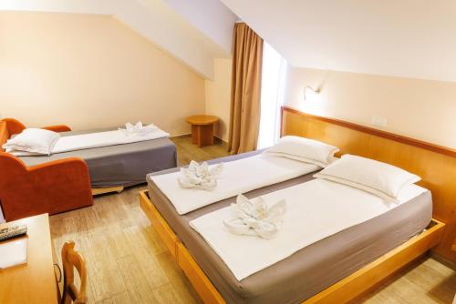 Hotel Vegov Hram - Tap to explore photos