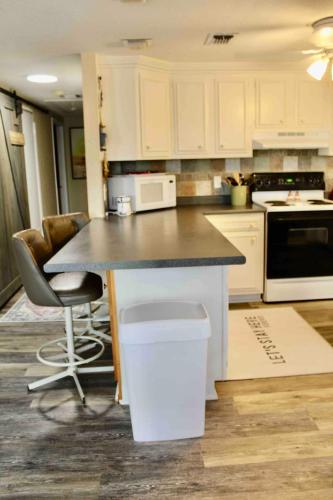 Lakefront Dock Fire Pit Sleeps 8 in Nocona, USA