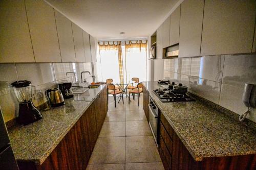 Three-Bedroom Apartment with Balcony room in Maison Verte - Premium Apart