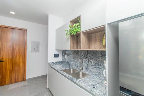 Stylish Condo with Rooftop Pool & Modern Amenities in Puerto Vallarta, Mexico