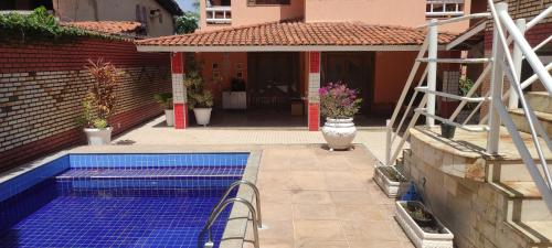 Casa com piscina – khách sạn tại Sao Cristovao
