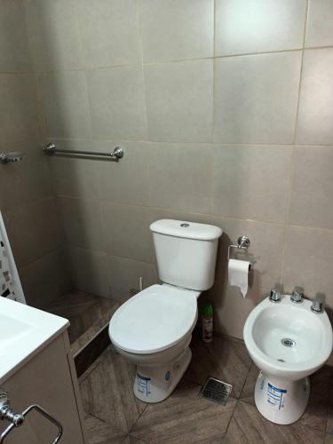 Two-Bedroom Apartment room in Monoambiente en la perla cerca de la playa con seña