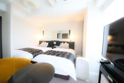APA Hotel Ginza Shintomicho Ekimae, Tokio (fotografie 3)