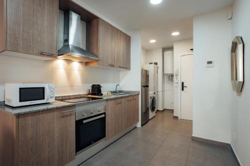 Santiago Apartments by Olala Homes