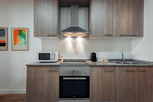 Santiago Apartments by Olala Homes