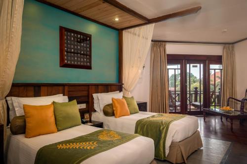 โรงแรมรอยัล ปาล์ม บีช (Royal Palms Beach Hotel) in วัดดูวา