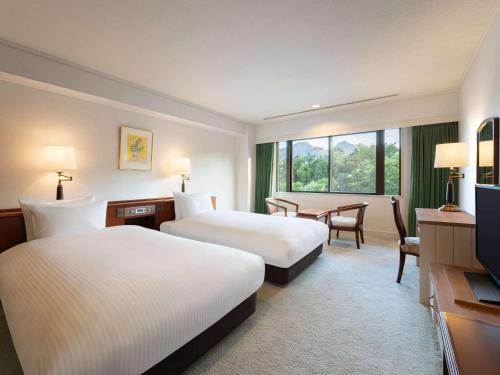 Classic Room with Two Single Beds and Two Sofa Beds