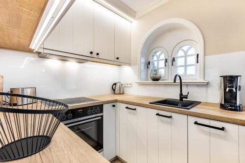 Kitchen, Ferienhaus Luv in Munkmarsch