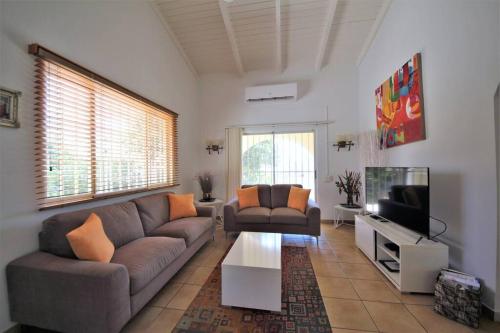 Paradera Paradise - your ultimate 5-bedroom getaway in Paradera