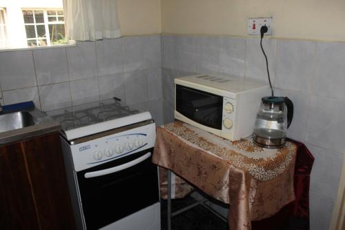 ห้องครัว, Tinotenda Cottage in ฮาราเร