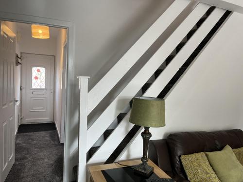 Lobby, Modernised central Wigan townhouse sleeps up to 6 in Ince