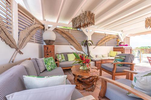 Балкон/тераса, Bungalow confortable à Bouillante, 40 m² avec piscine partagée (Bungalow confortable a Bouillante, 40 m² avec piscine partagee) in Bouillante