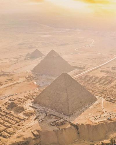 The Sun, Sand, and Pyramids of Heaven The Sun, Sand, and Pyramids of Heaven