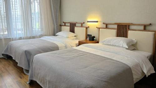 鸿胪花园酒店 入住赠送百威啤酒2瓶 鸿胪花园酒店 入住赠送百威啤酒2瓶