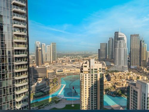 Glamorous Full Fountain view High Floor 4 BR APT, Дубай