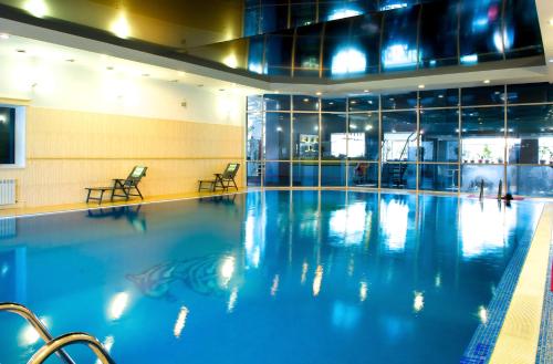 مسبح, Hotel & Fitness Center MANDARIN in أكتاو