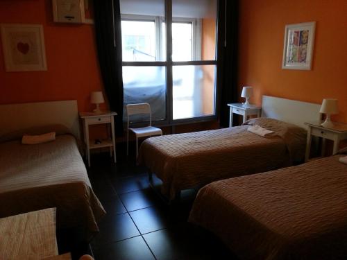 Camera tripla, bagno in comune, 3 letti